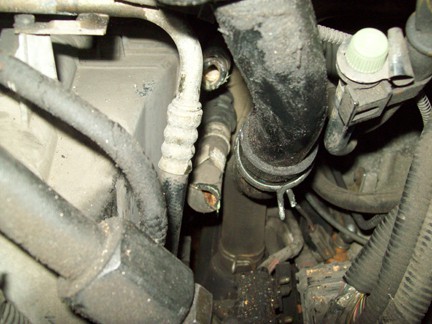 To avoid the arduous dashboard R&R, the heater hoses going to the core were simply cut.